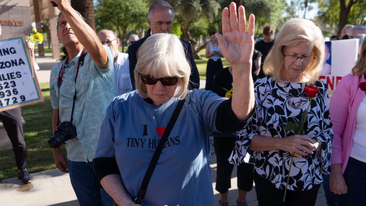 Pro-life supporters protest a vote repealing an 1864 abortion ban