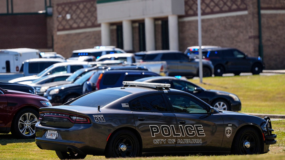 Police vehicles are seen outside Apalachee High School