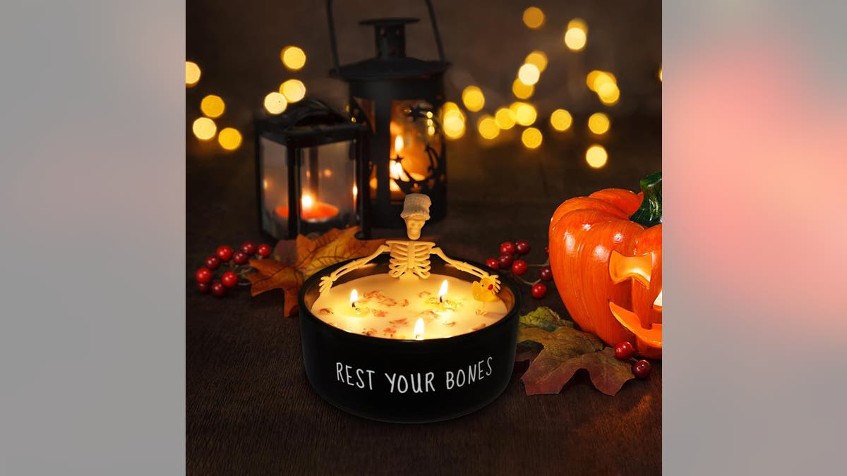 Add a spooky candle to the basket.