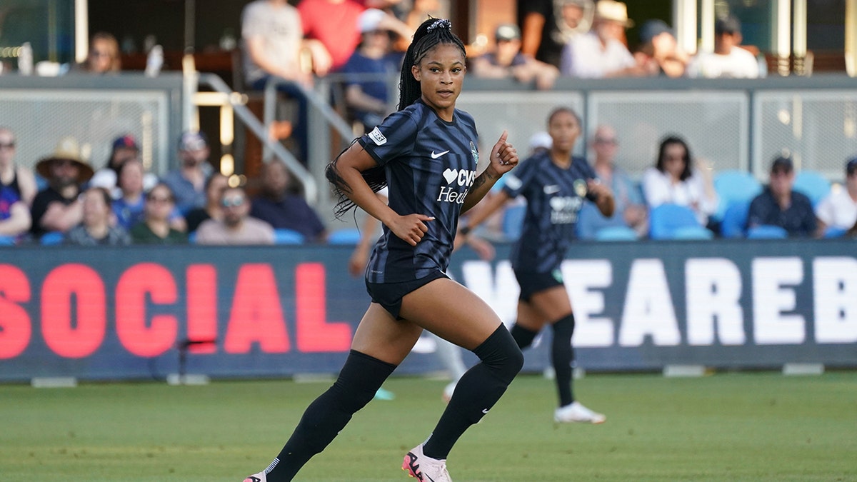 Croix Bethune plays in a soccer game