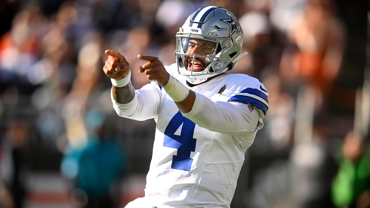 Dak Prescott points to celebration