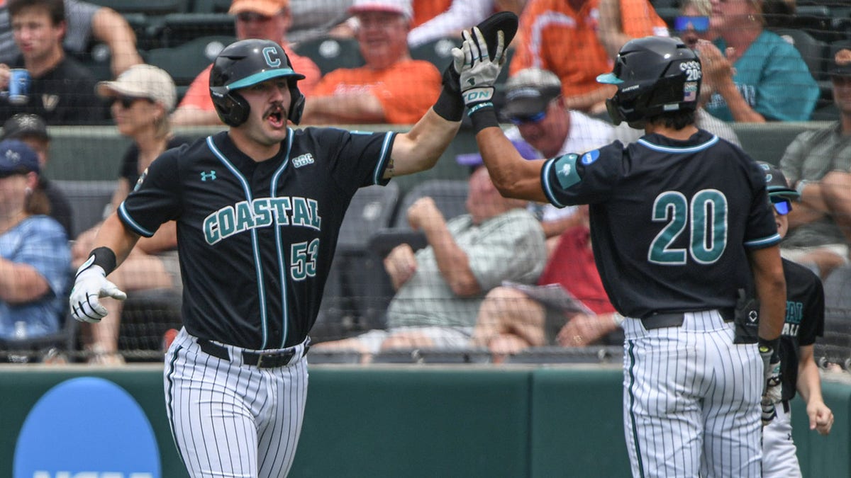 Derek Bender celebrates