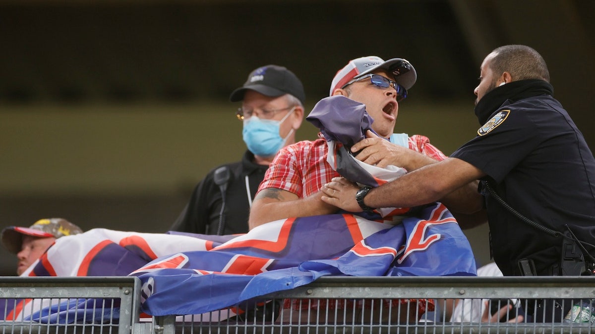 In the spring and summer of 2021, a man was removed from MLB games at Yankee Stadium, Fenway Park and Citizens Bank Park for hanging banners from the stands that read "Trump Won! Save America!"