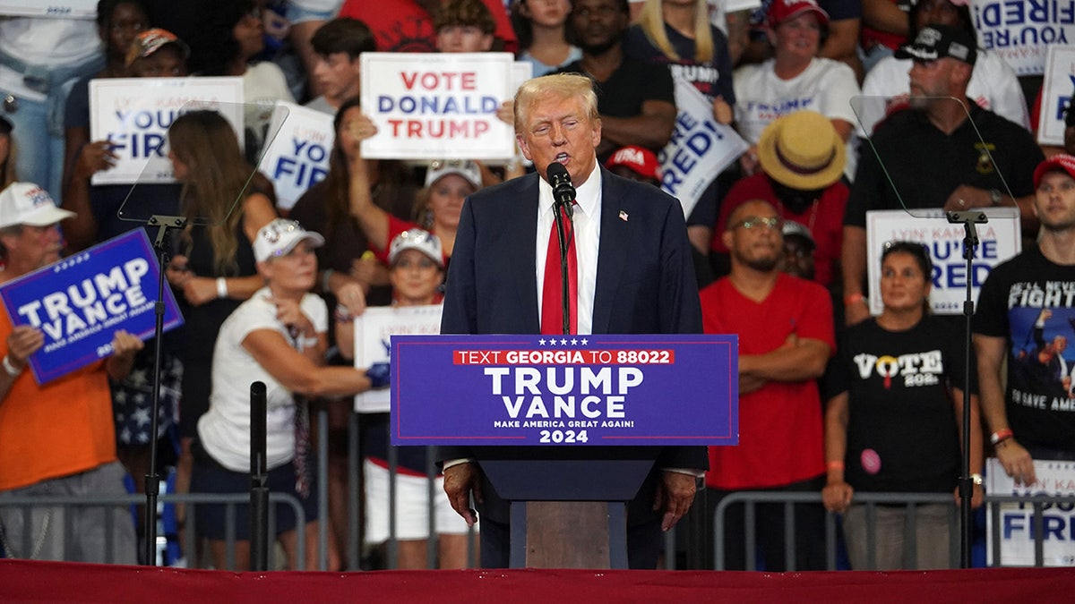 Republican presidential candidate and former U.S. President Donald Trump speaks during a campaign rally with Republican vice presidential candidate Senator JD Vance in Atlanta, Georgia, August 3, 2024. Reuters/Megan Varner