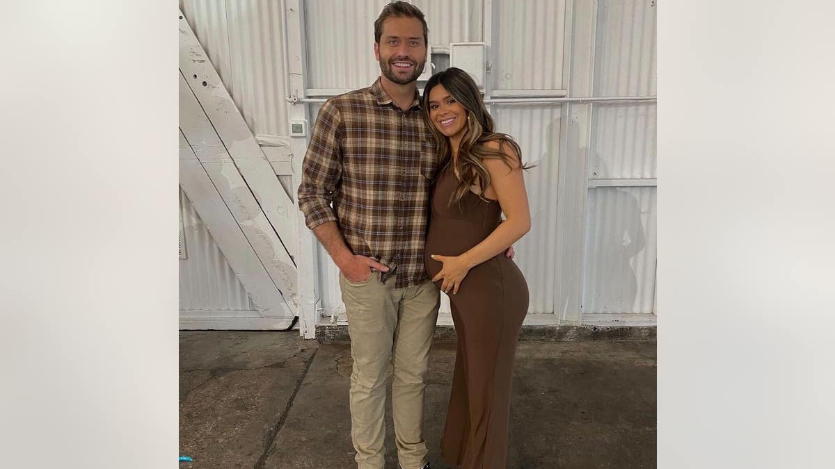 Taylor Frankie Paul pregnant poses with boyfriend Dakota Mortenson