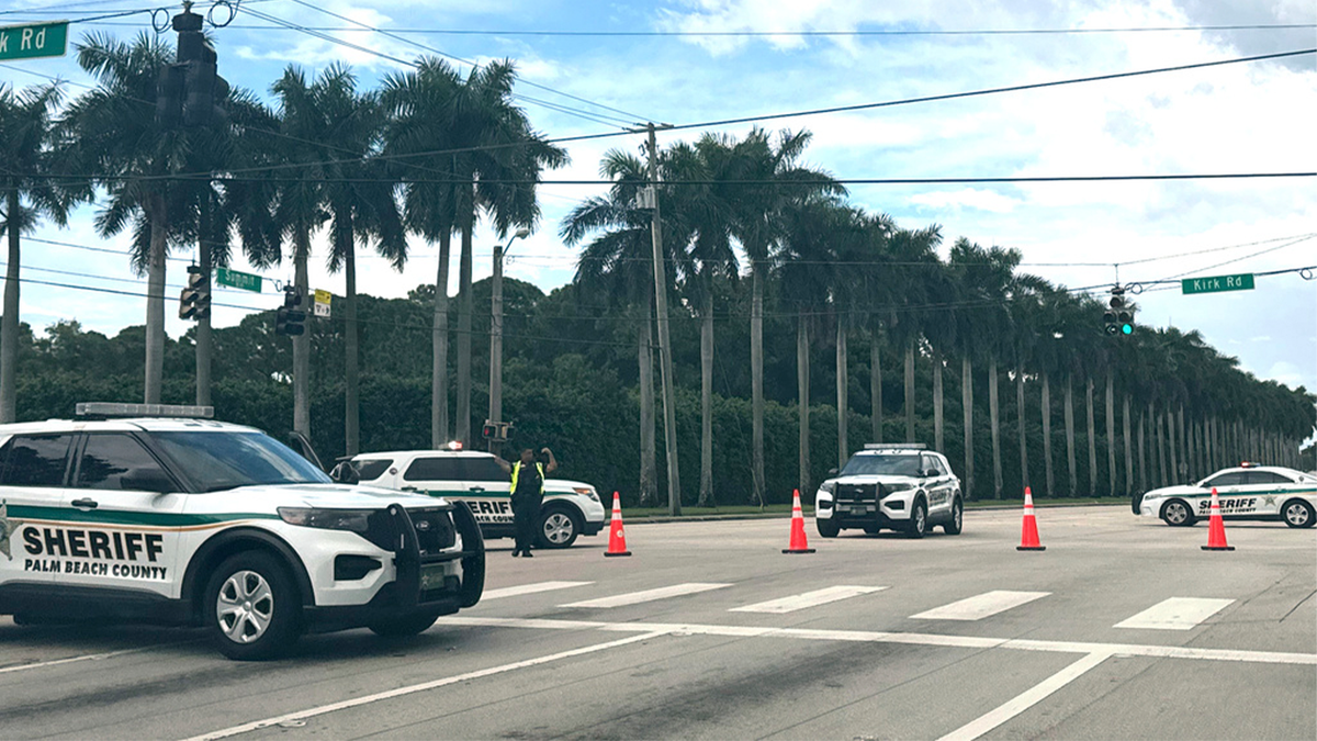 Sheriff's vehicles are seen near the Trump International Golf Club in West Palm Beach, Florida, on Sunday, Sept. 15, 2024, after gunshots were reported near Republican presidential candidate and former President Donald Trump.