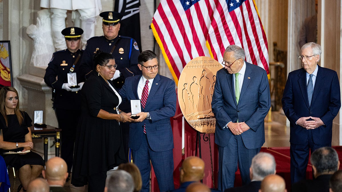 Johnson and Schumer present Gold Medal