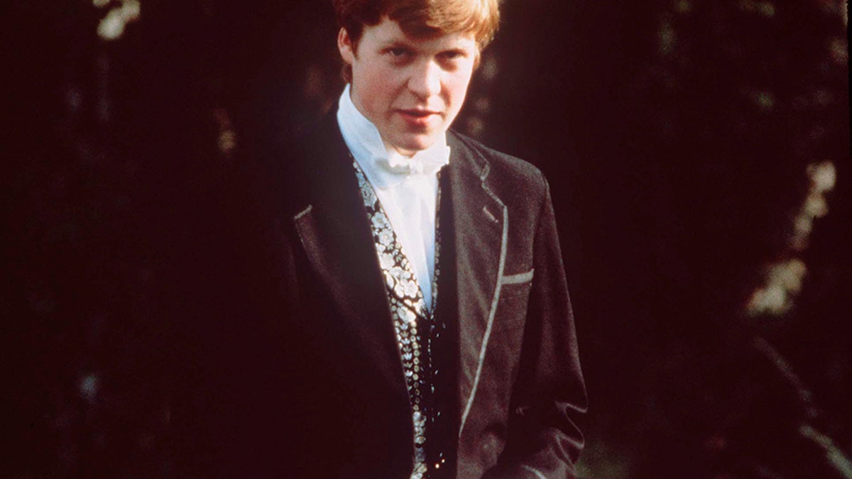 Earl Charles Spencer wearing a suit.