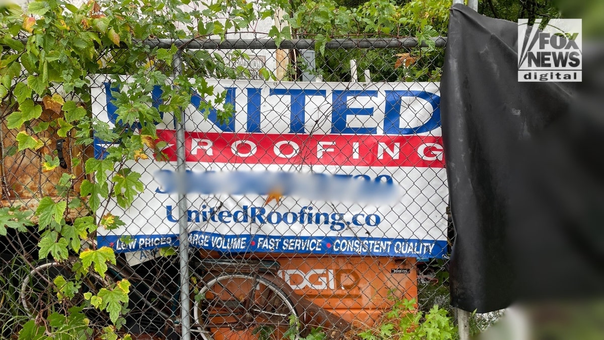 A photo of the United Roofing sign