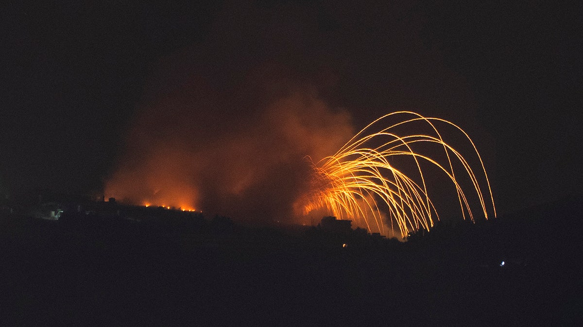 As seen from northern Israel, an area in southern Lebanon was hit by Israeli shelling