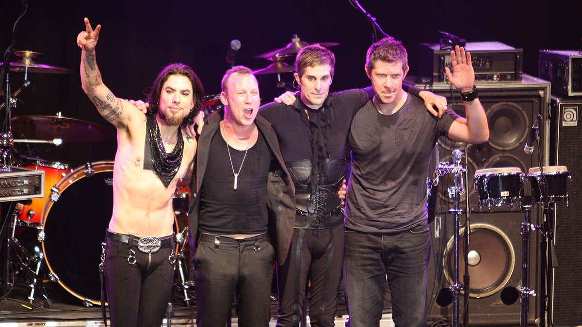 Dave Navarro, Stephen Perkins, Perry Farrell, and Eric Avery of Jane's ADdiction connected  stage