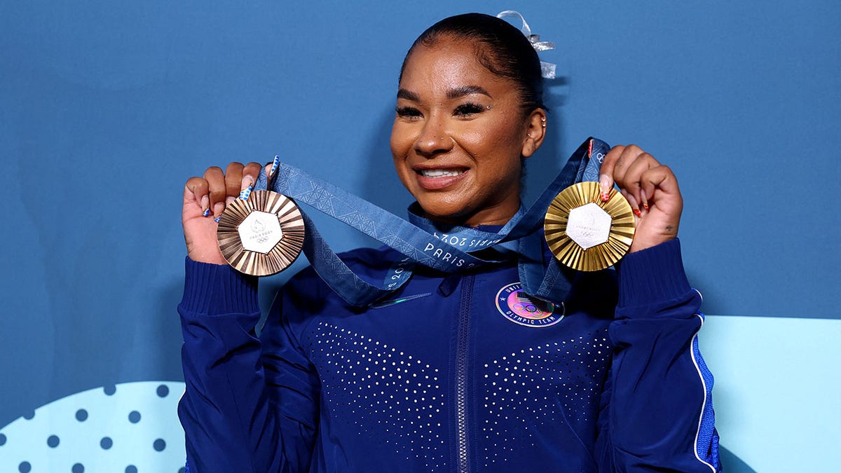 Jordan Chiles with her medals