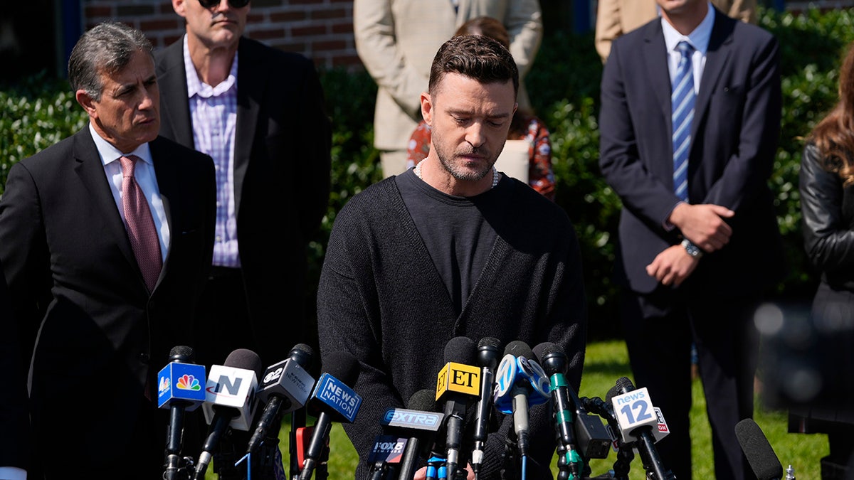 Justin Timberlake speaks to the press after a court hearing