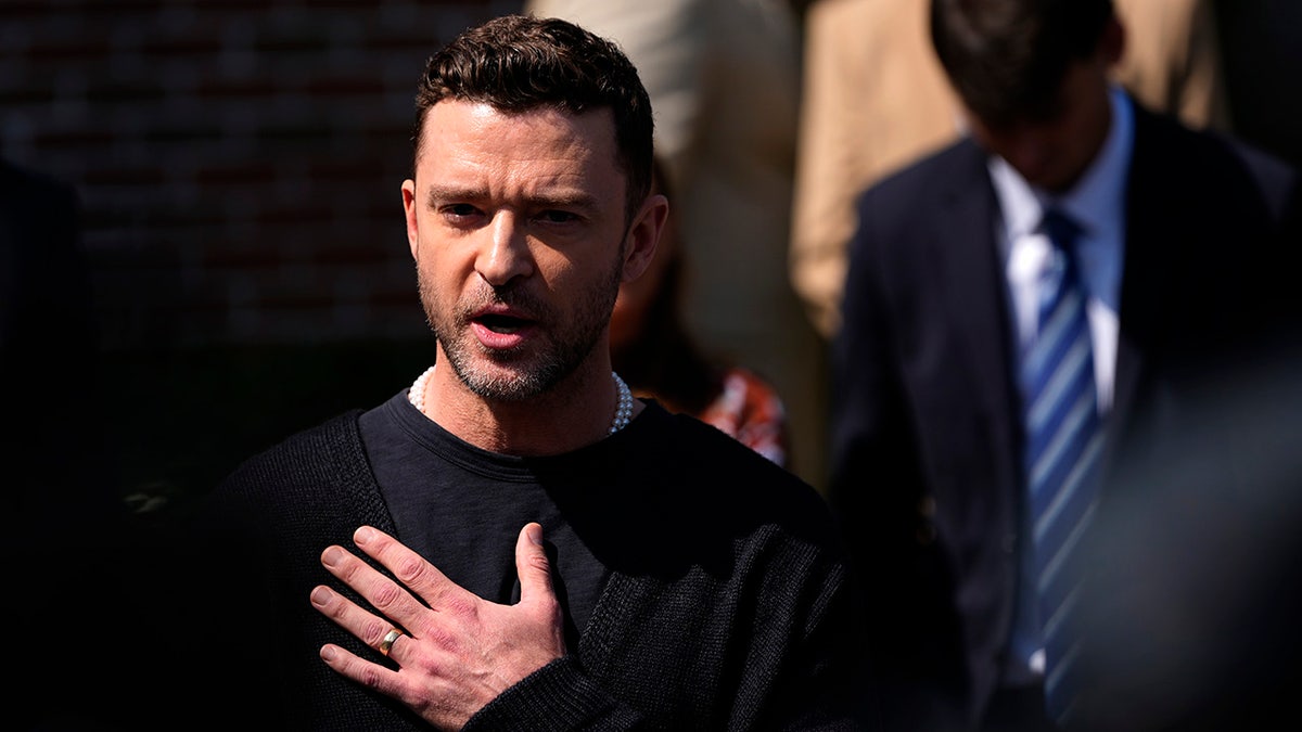 Justin Timberlake speaks to the press after a court hearing