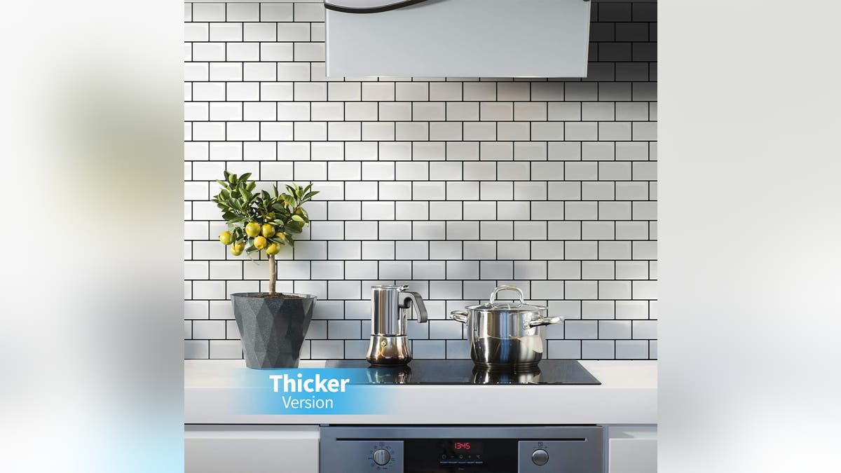 Vinyl tiles are an easy way to refurbish a kitchen backsplash.