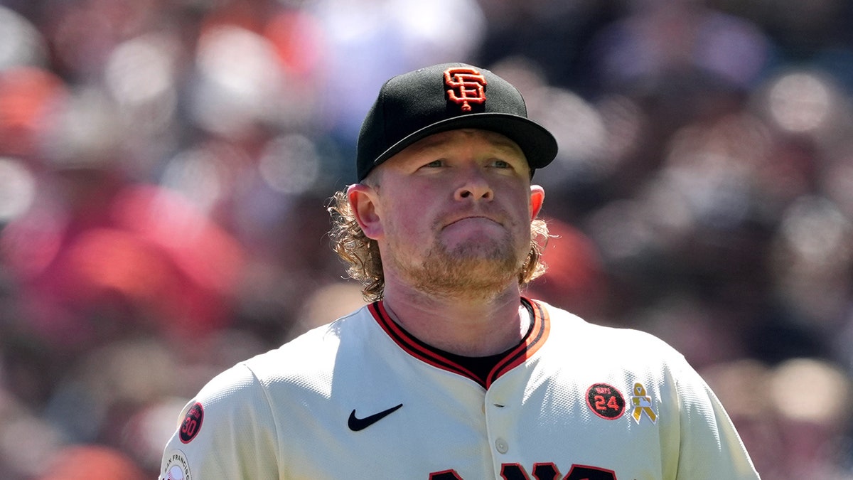 Logan Webb walks off field