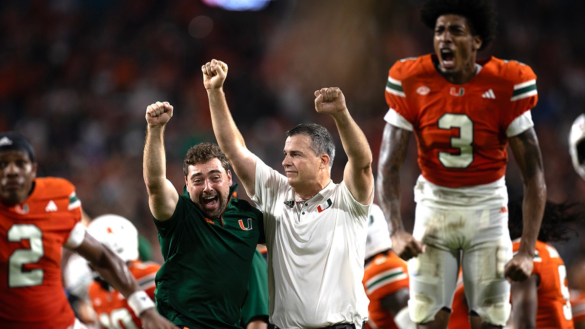 Mario Cristobal celebrates