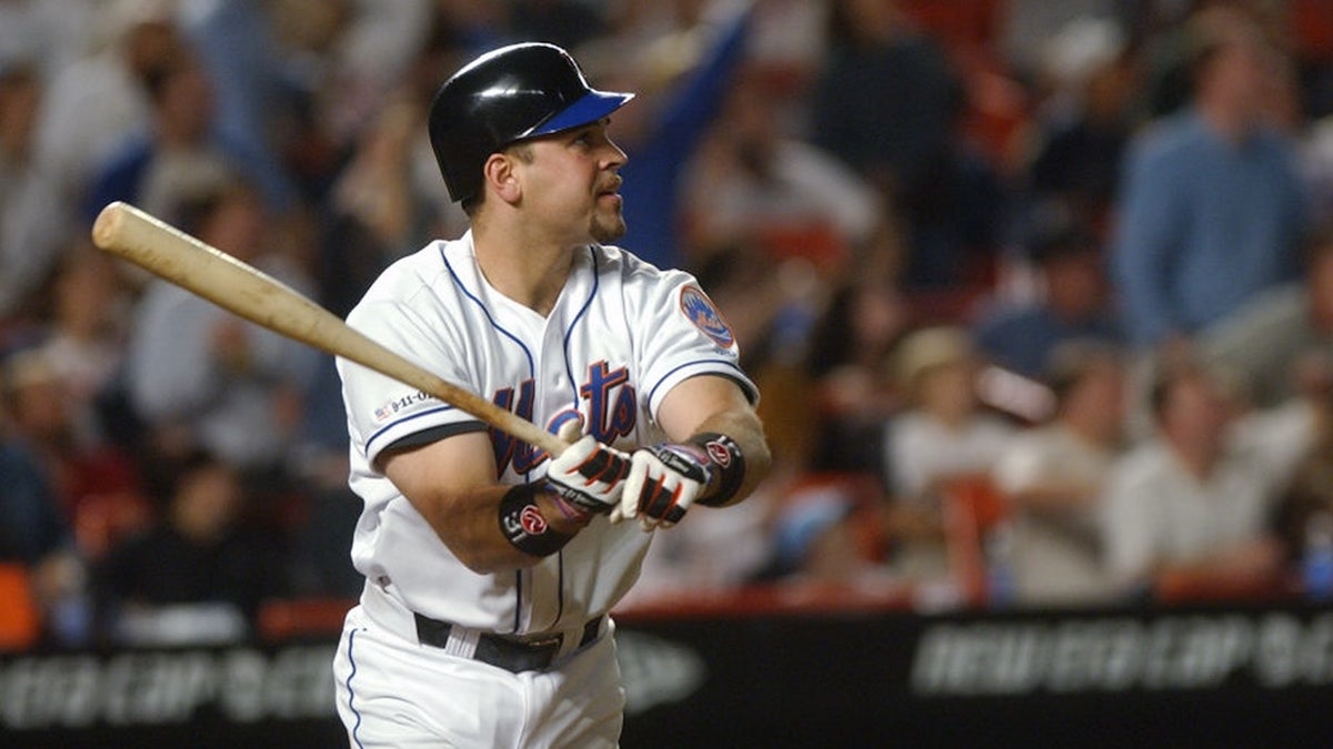 New York Mets' Mike Piazza hits an 8th inning homerun to lead the Mets past the Atlanta Braves, 3-2, on a patriotic and dramatic night at Shea Stadium as baseball returns to New York City.