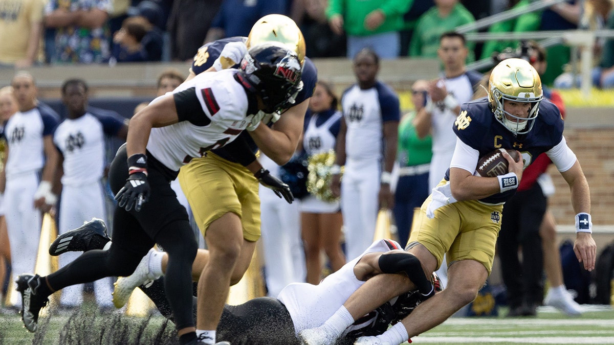 A Northern Illinois football player makes a tackle