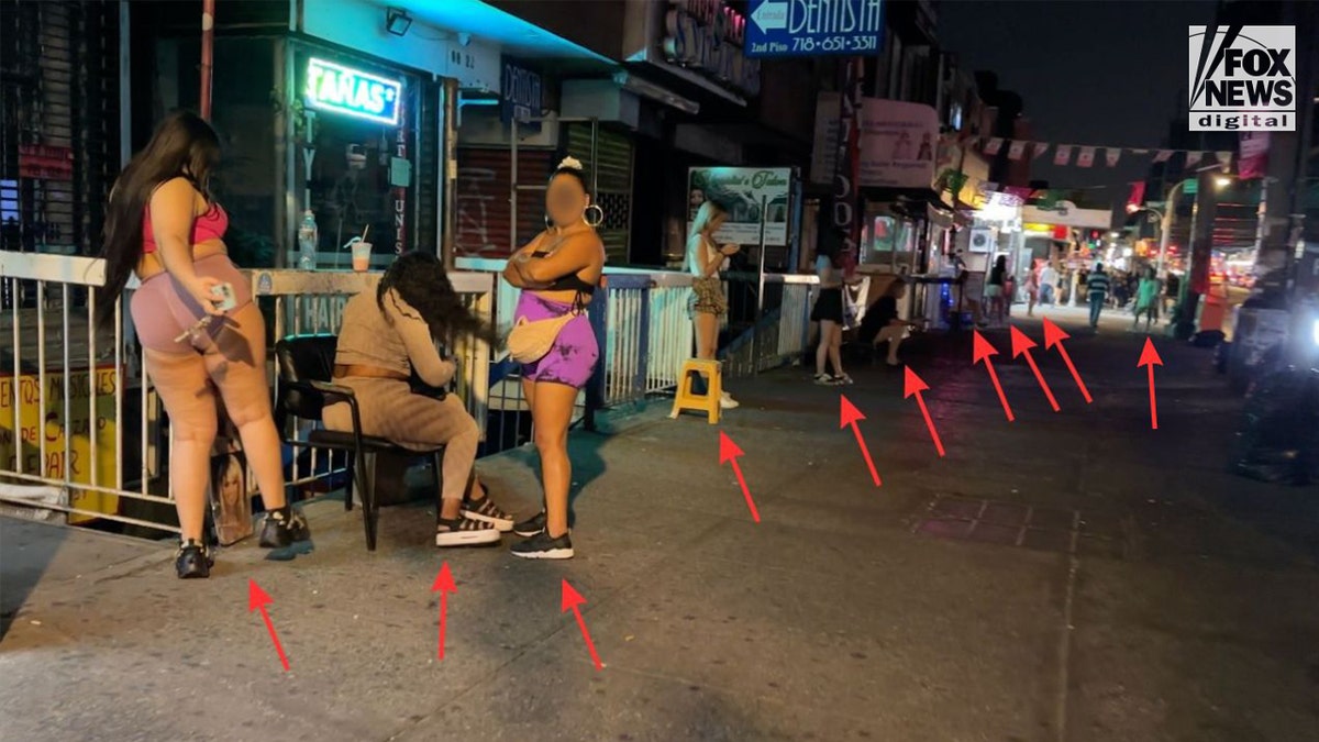 Prostitutes line a street in Queens