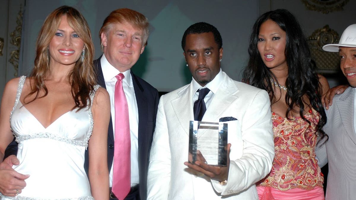 Donald and Melania Trump with Sean 'Diddy' Combs in 2005