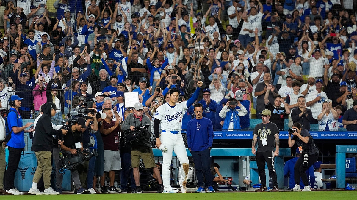 Shohei Ohtani celebrates his slam