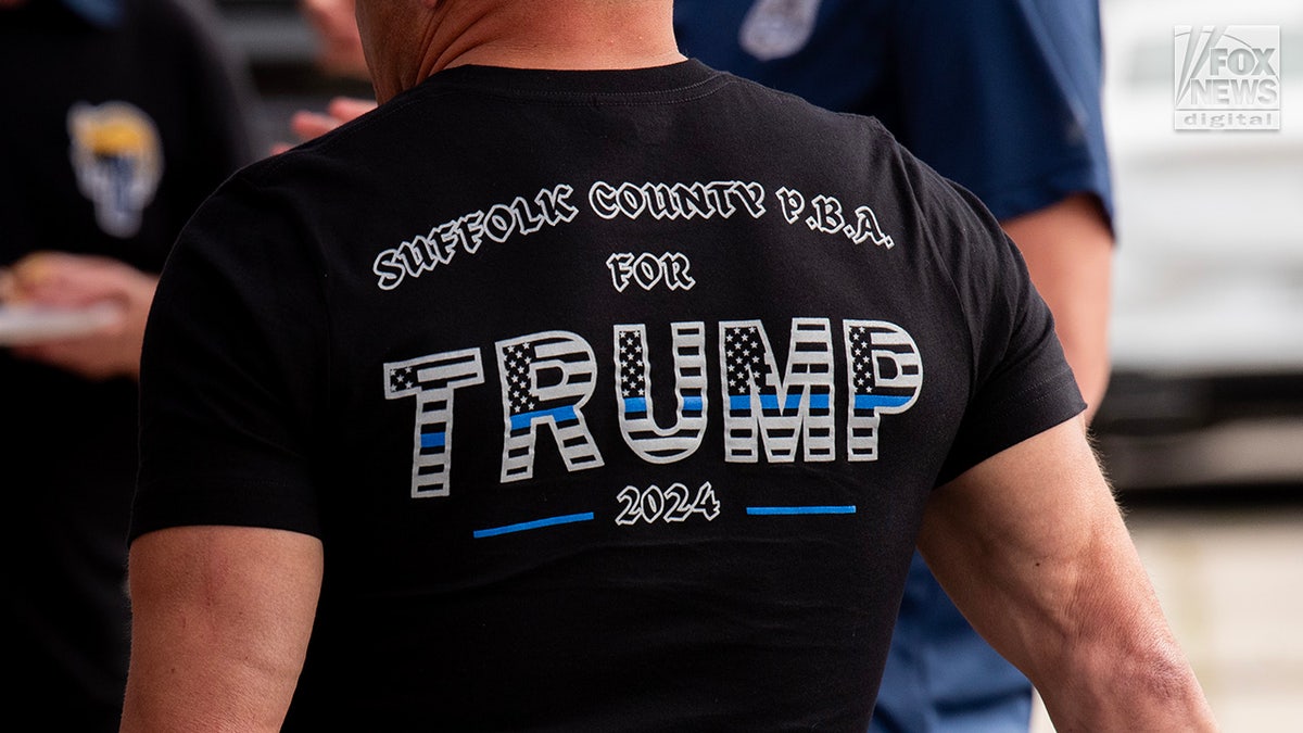 Members of the Suffolk County PBA attend a tailgate ahead of former President Donald Trump’s rally in Uniondale, New York