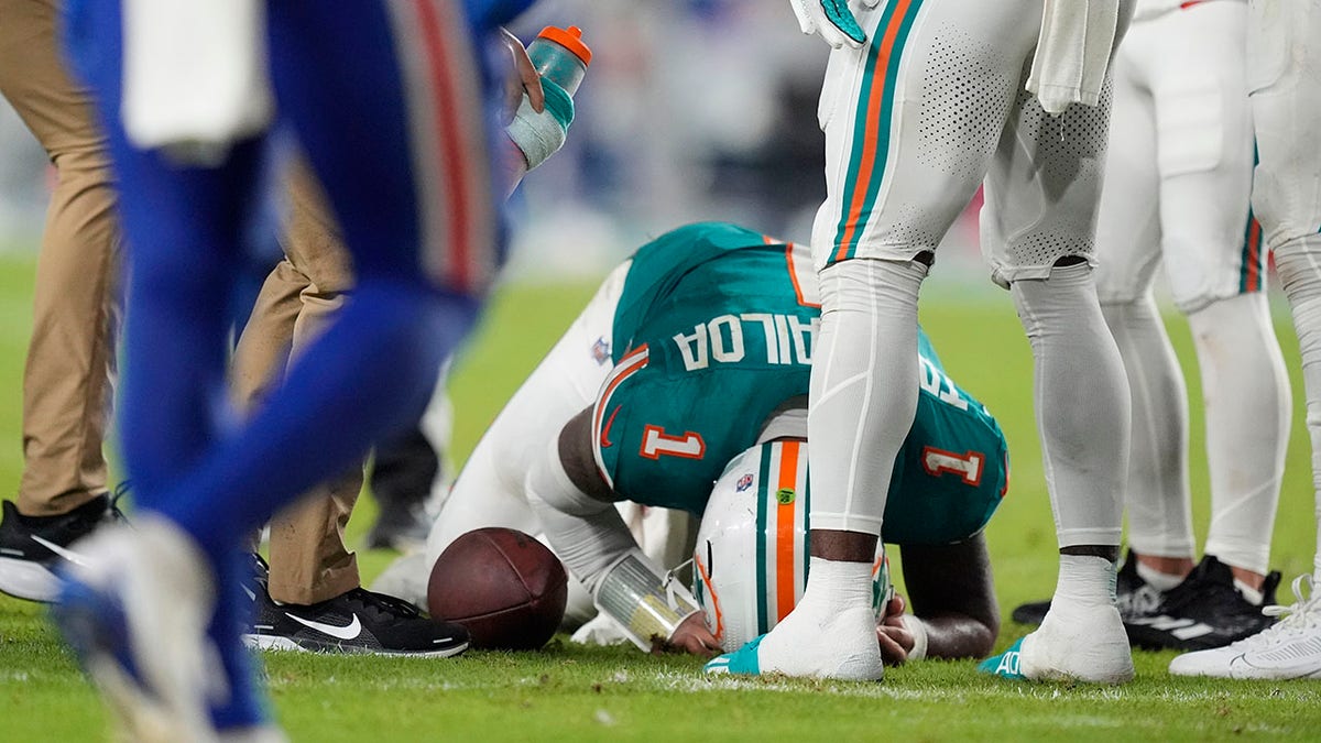 Tua Tagovailoa on the ground