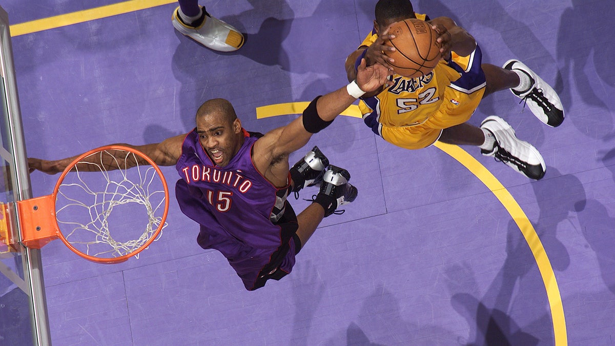 Vince Carter tries to grab the ball