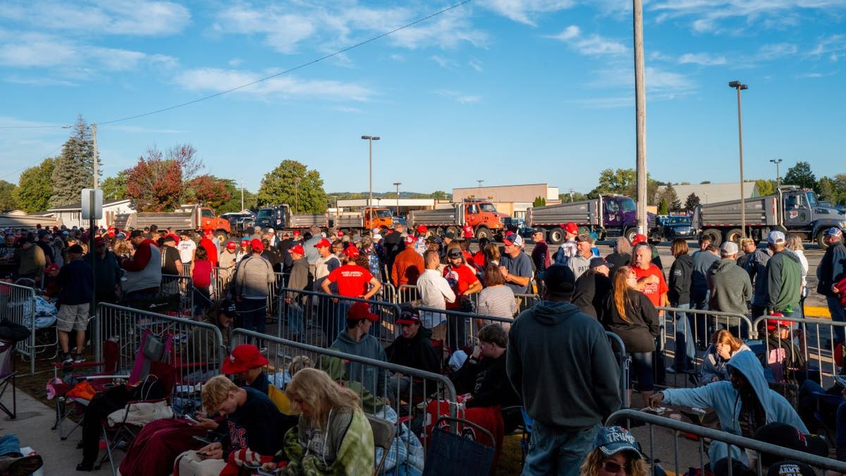 Supporters outside the rally