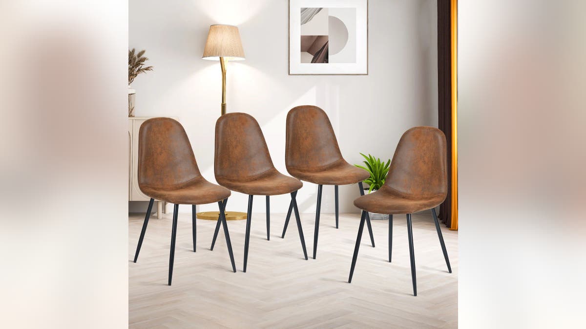 These broadside  chairs are precise  modern   looking.