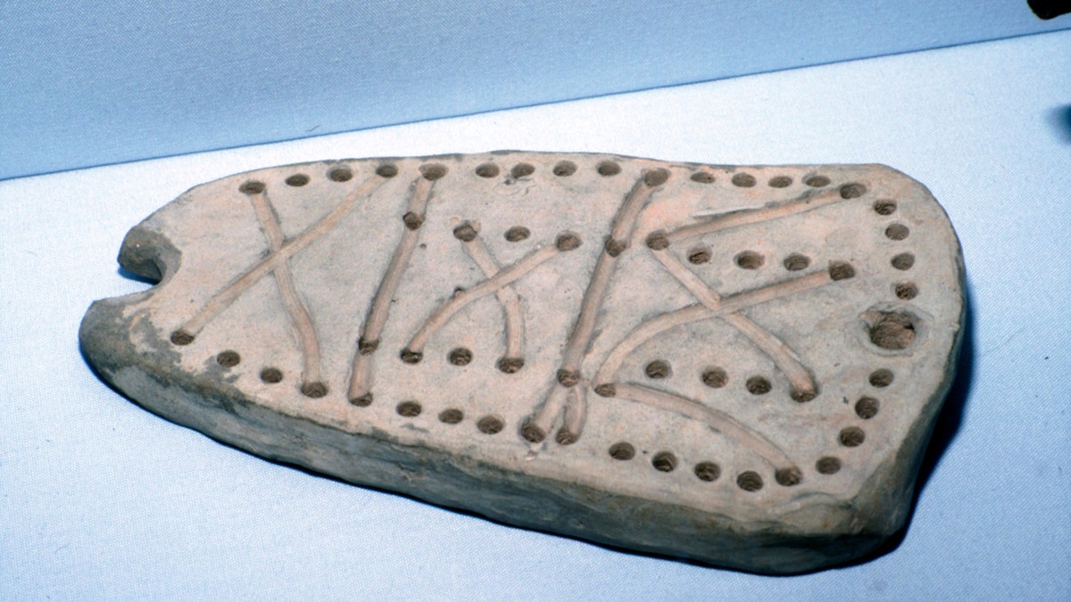 Archaeological discovery suggests ancient board game has different ...