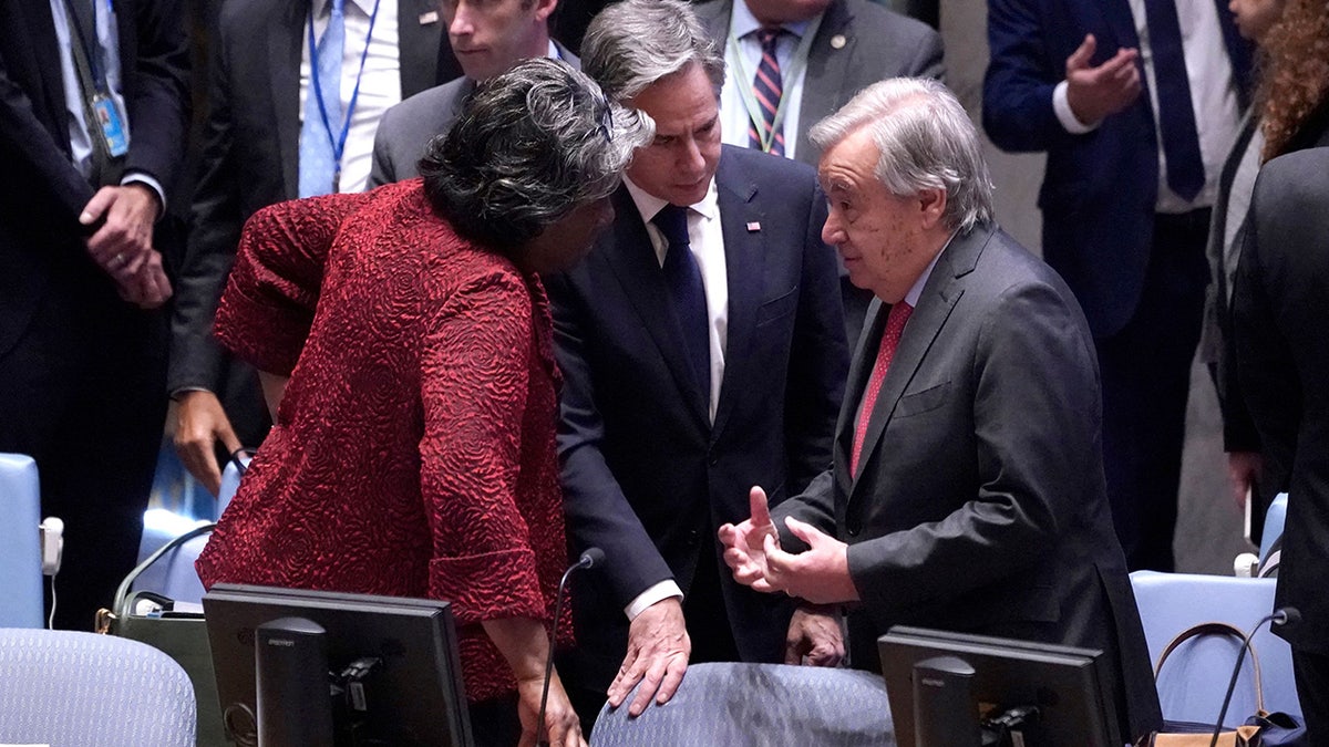 Secretary of State Antony Blinken, center, speaks with Secretary-General Antonio Guterres and U.S. Ambassador to the U.N. Linda Thomas-Greenfield before the start of a Security Council meeting at U.N. headquarters in New York City on Oct. 24, 2023.