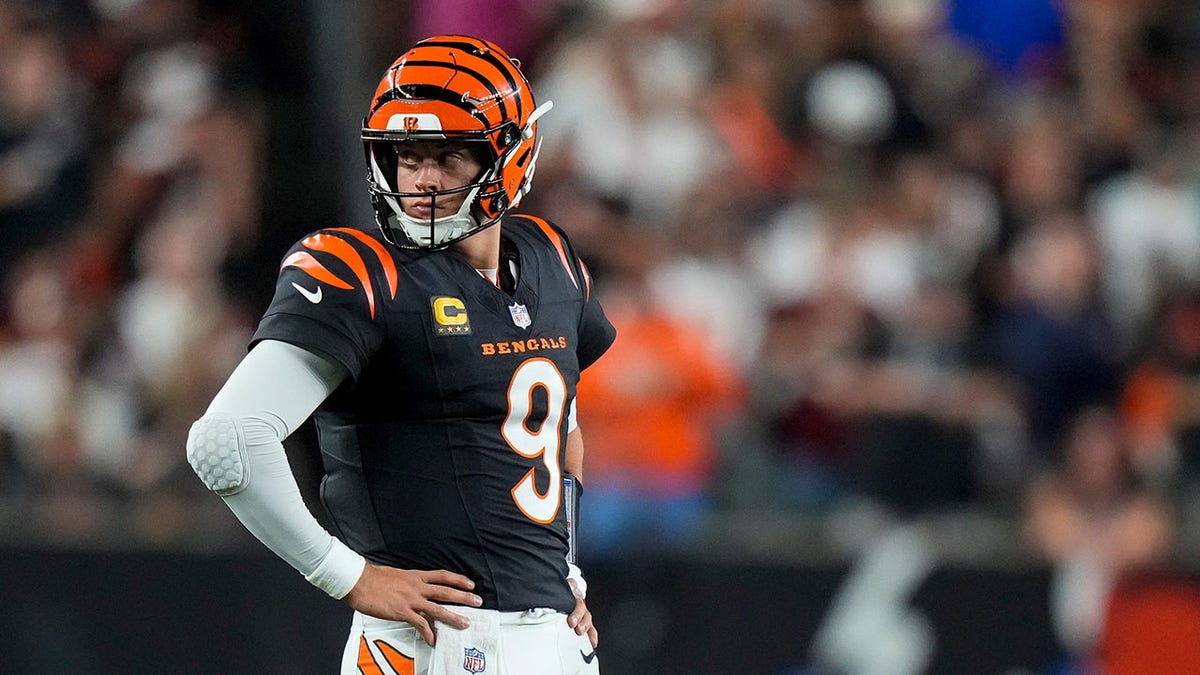 Cincinnati Bengals quarterback Joe Burrow, #9, stands between plays in the second quarter of the Week 3 NFL game between the Cincinnati Bengals and the Washington Commanders at Paycor Stadium in Cincinnati on Monday, September 23, 2024.