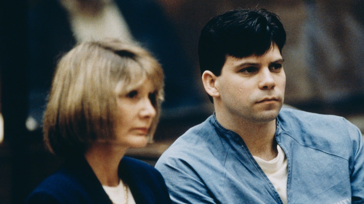 Lyle Menendez sitting next to his lawyer in court in 1994