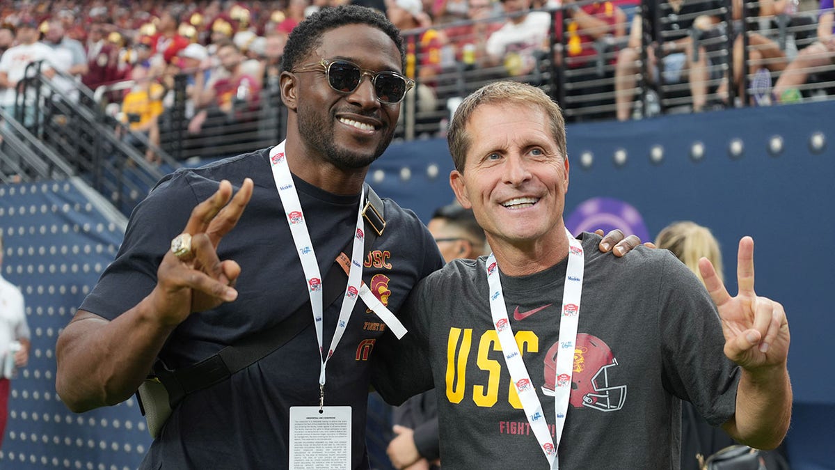 Signo de la paz de Reggie Bush