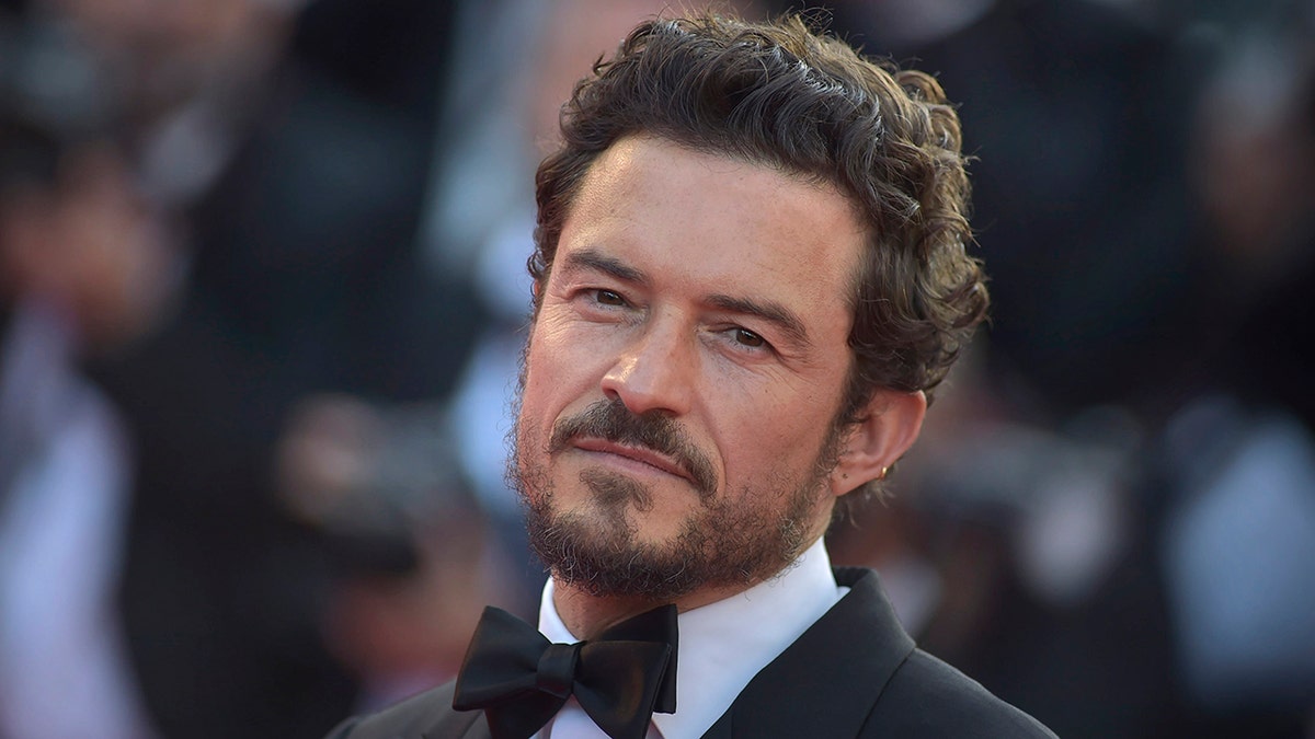 Orlando Bloom in a classic tuxedo on the Cannes carpet