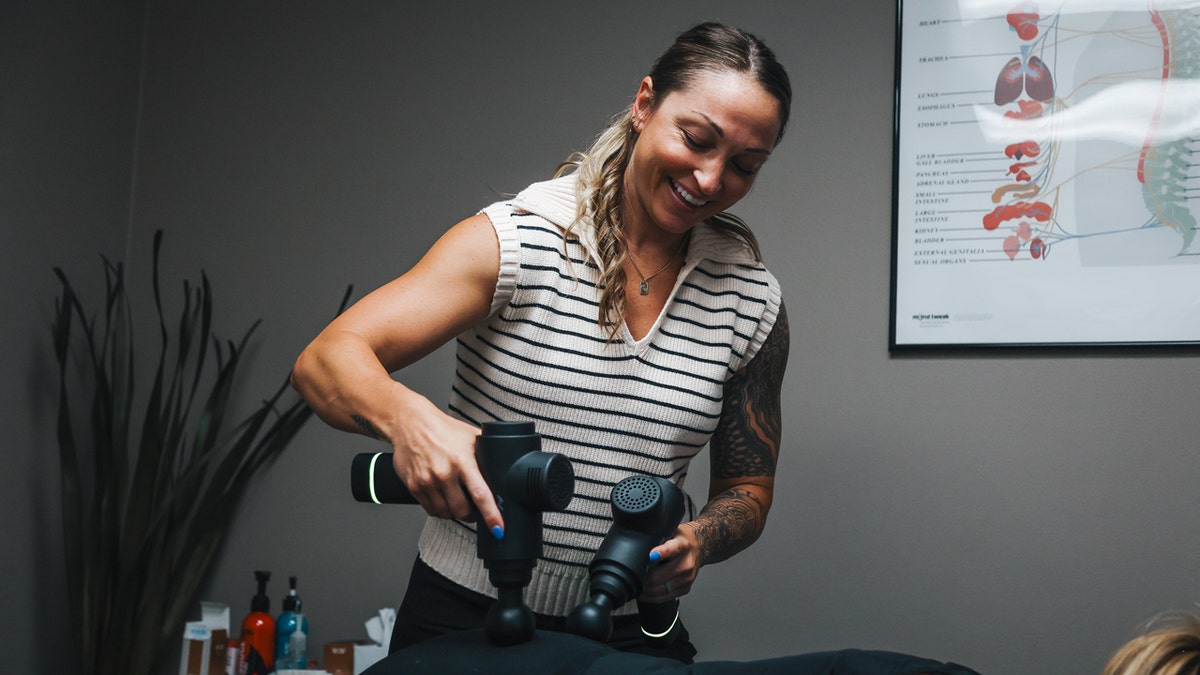 Dr. Mary Codd treating a patient at Chiro