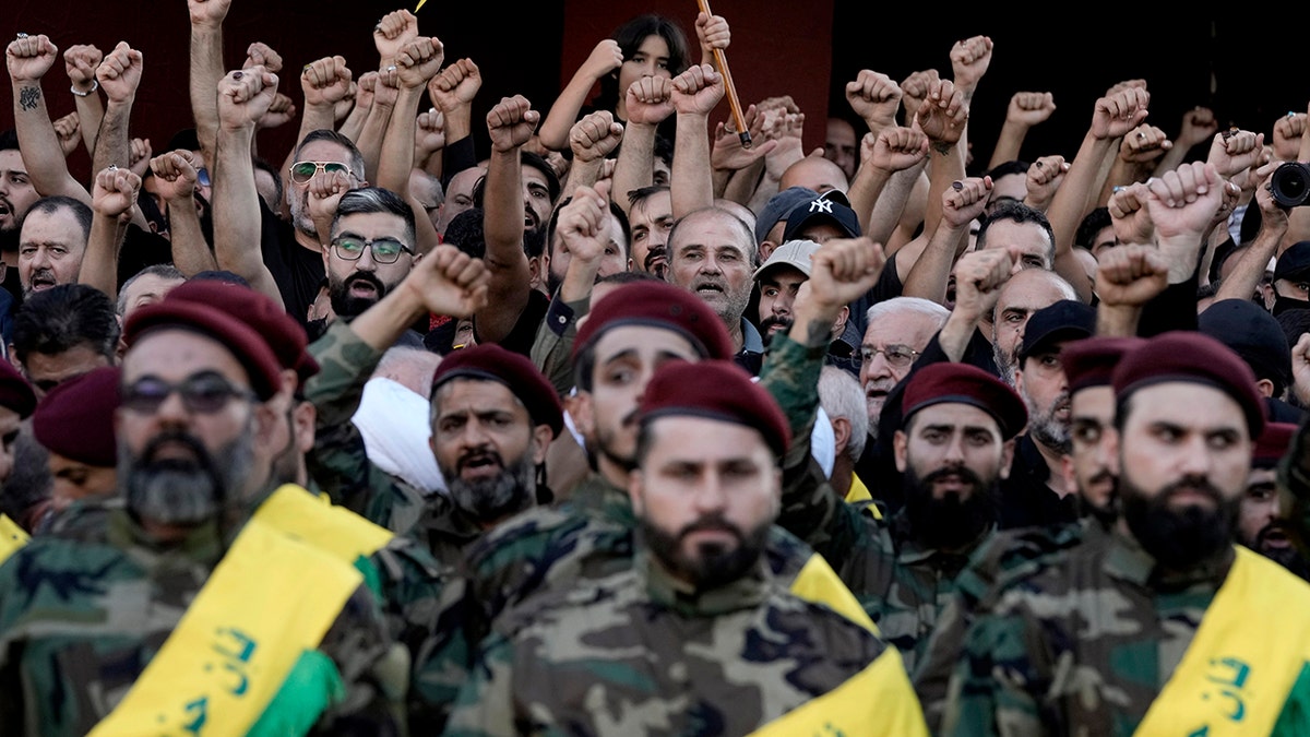 Hezbollah members mourn