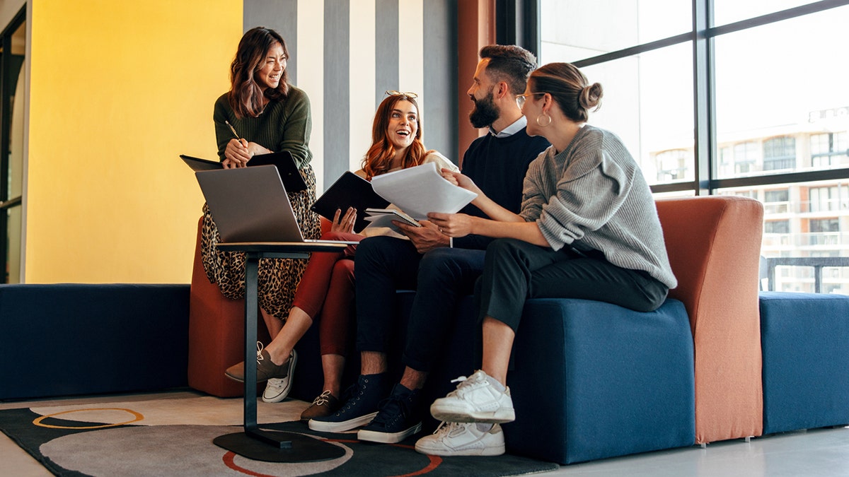 young employees work together at an office