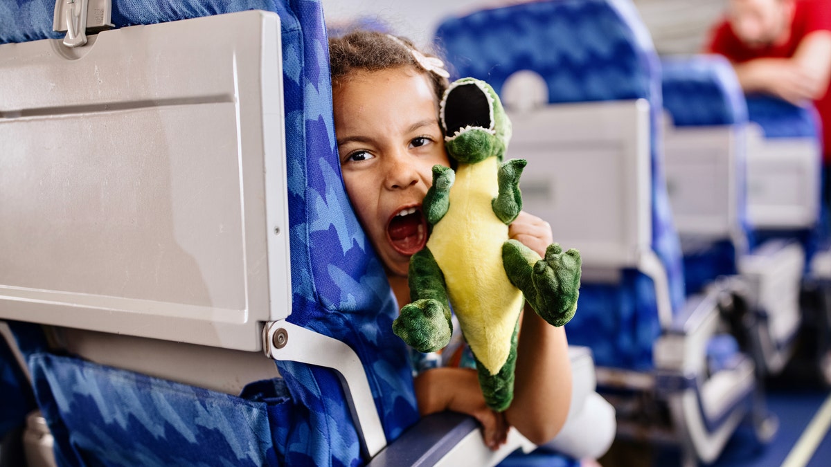 niños en el avión