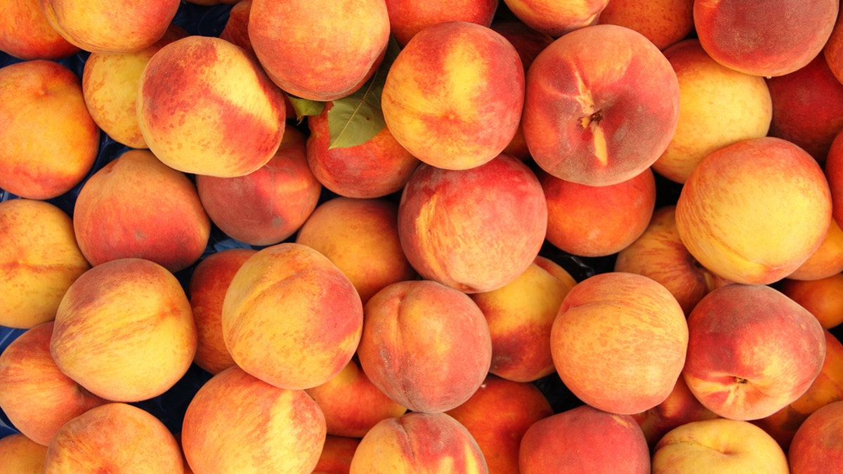 Peaches and nectarines at a farm shop.