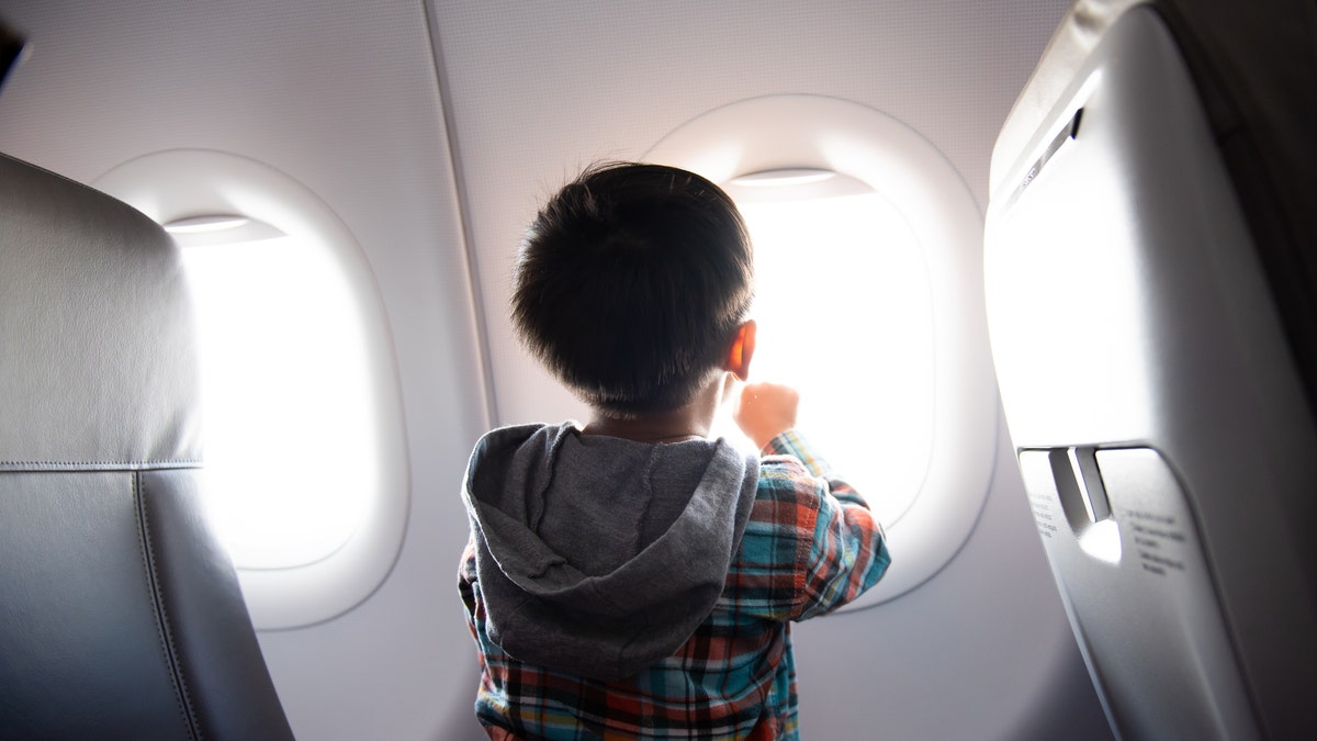 child on plane