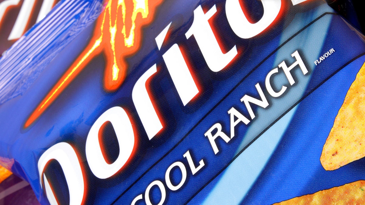 A close-up of Cool Ranch Doritos.