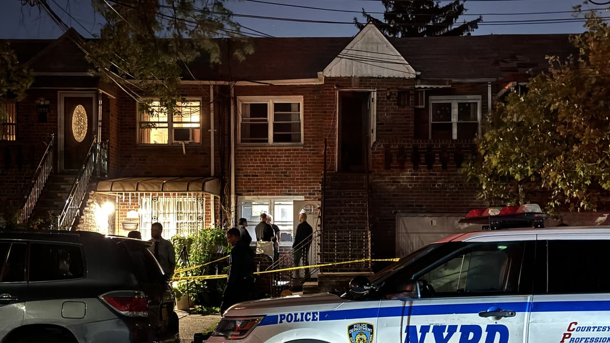 NYPD in front of a residential building