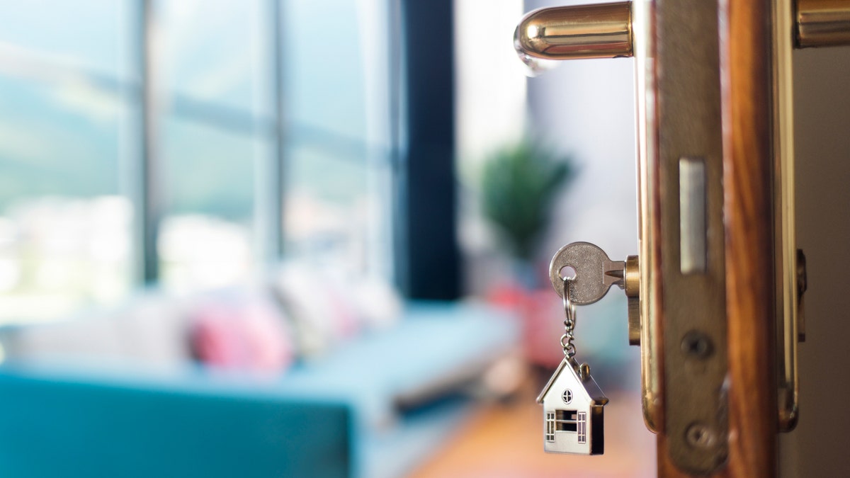 A key that opens the door of a house.