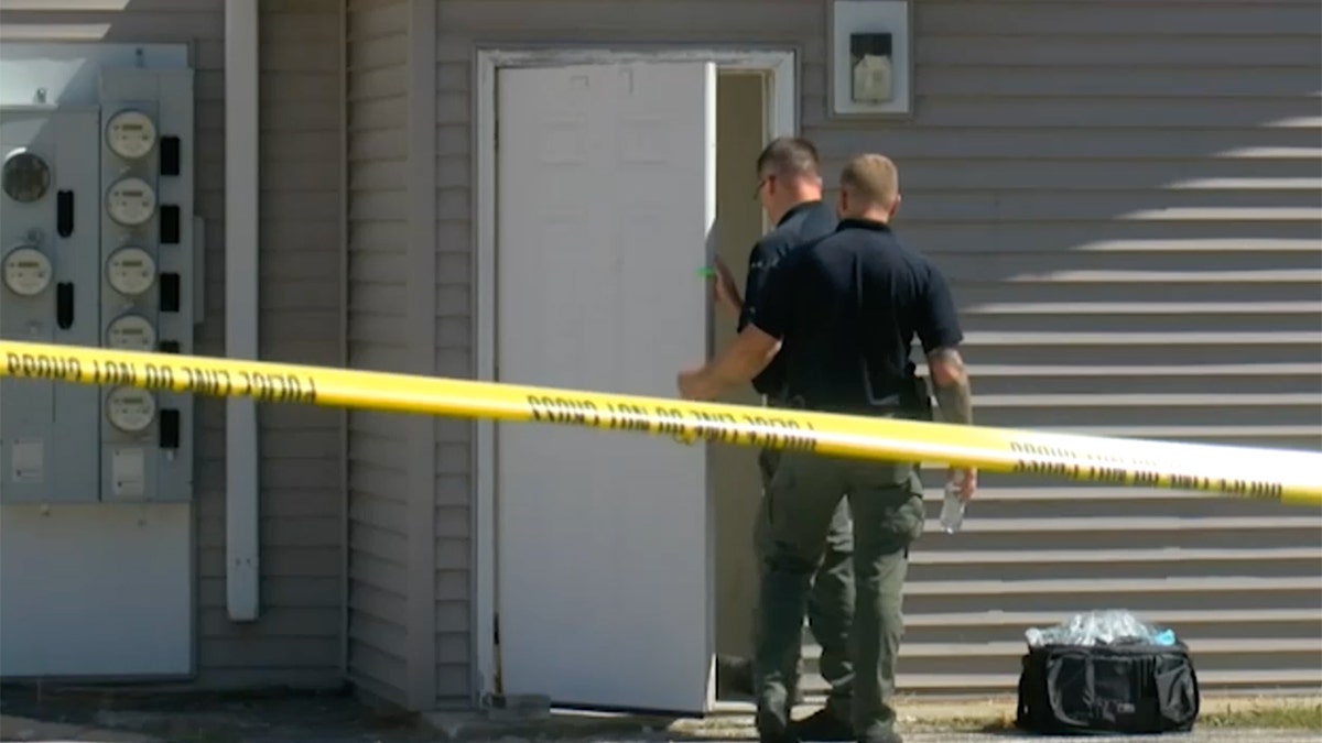 Investigators at a crime scene in Whitewater, Wisconsin