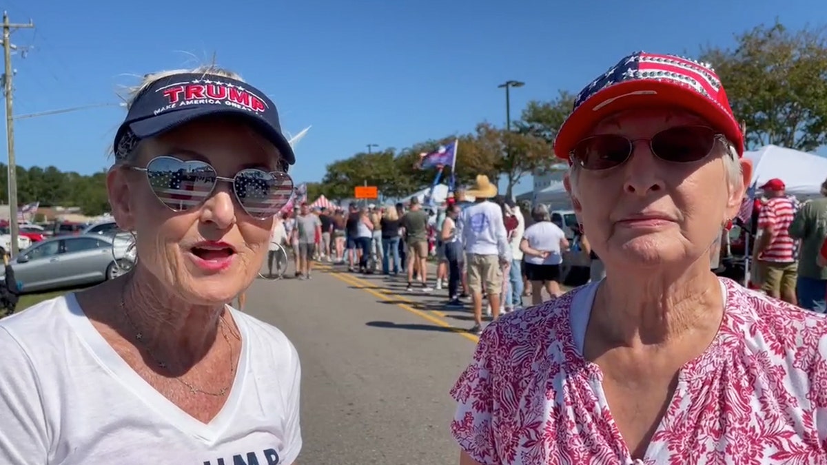 Two women astatine  Trump rally