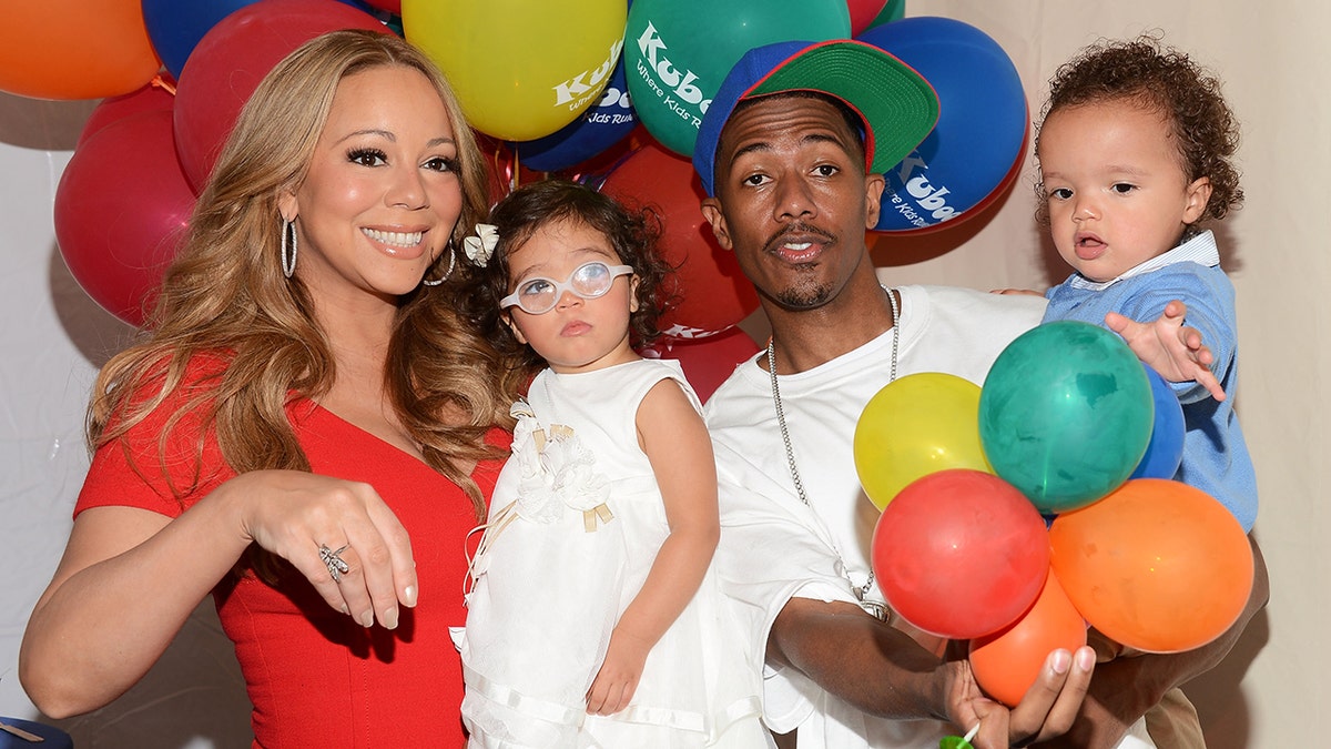 Nick Cannon and Mariah Carey with their twins at Nick Cannon's "Family Day" event.