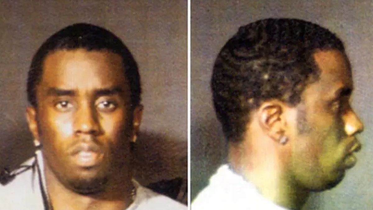 Sean Diddy Combs posa para una foto policial 1999